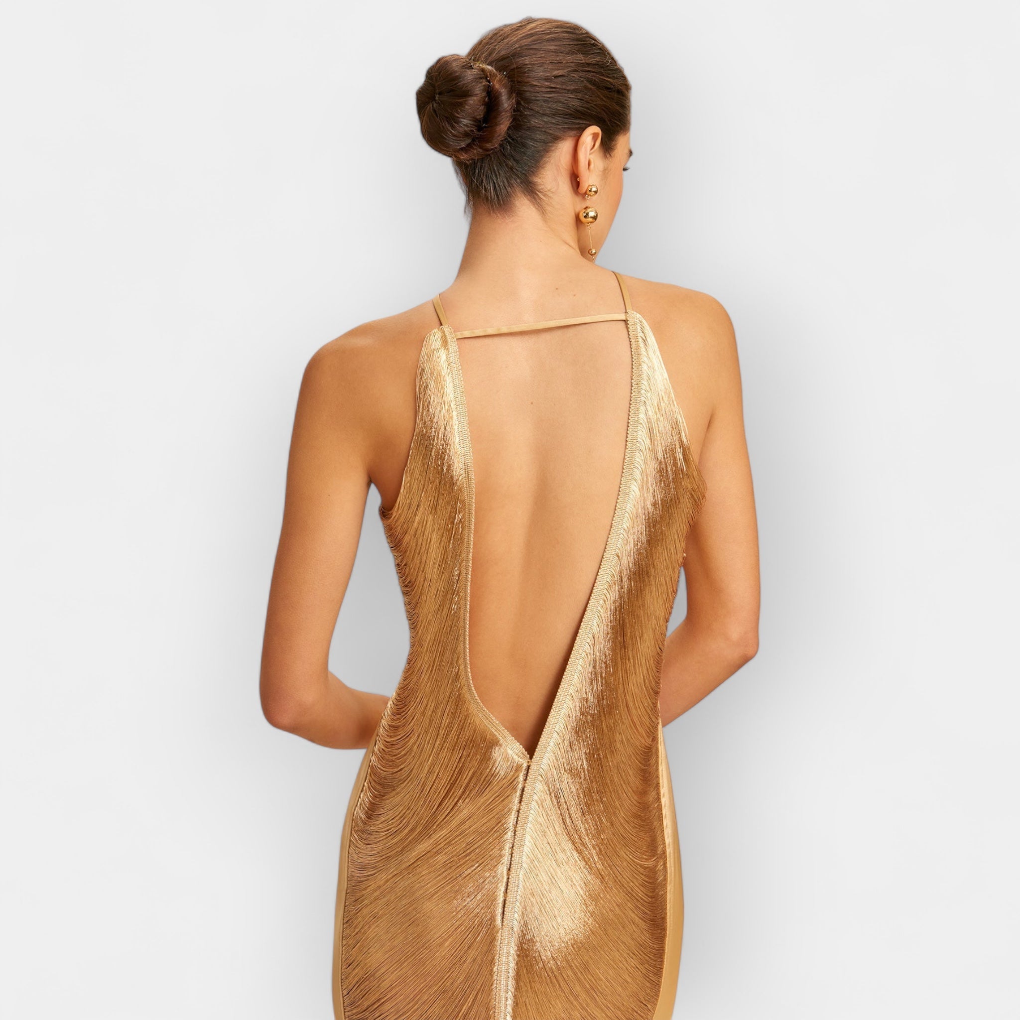 Vestido midi con flecos dorados